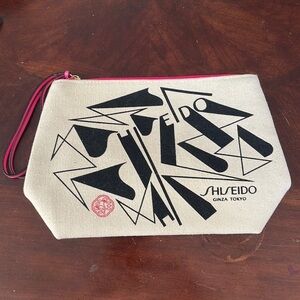 Shisheido pink lined zippered makeup bag New without tags